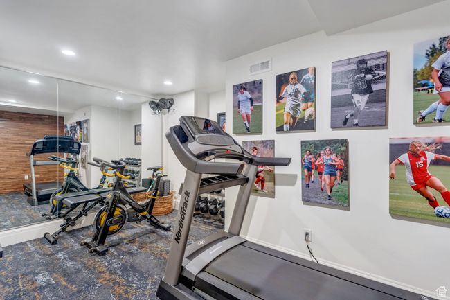 Exercise area featuring recessed lighting and baseboards | Image 71