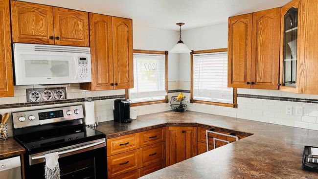 207 4th Street W, House other with 3 bedrooms, 2 bathrooms and 2 parking in Bow Island AB | Image 4