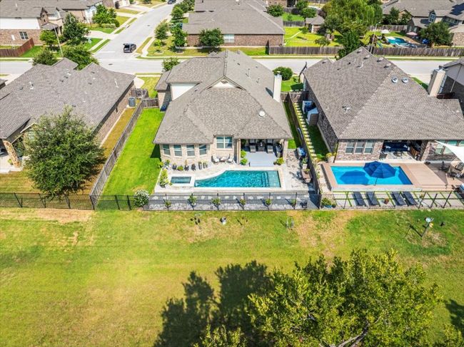 Aerial view of residential area featuring a pool | Image 34