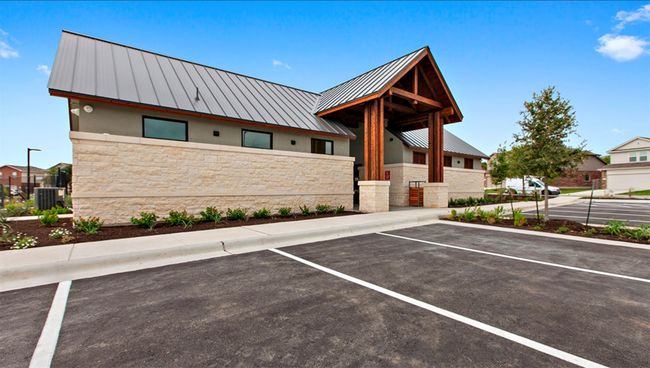 View of building exterior with uncovered parking | Image 36