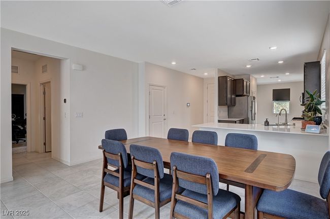 Dining space featuring recessed lighting, light tile patterned floors, and baseboards | Image 10