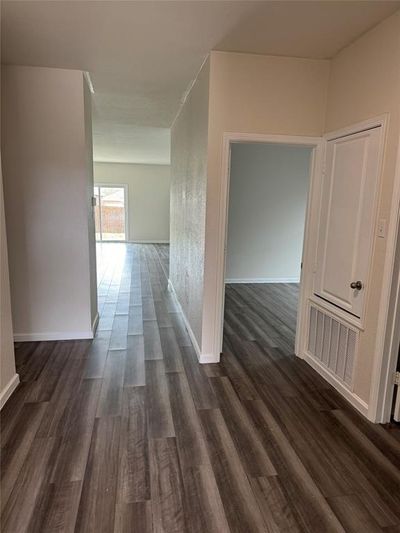 Hall featuring dark hardwood / wood-style floors | Image 2