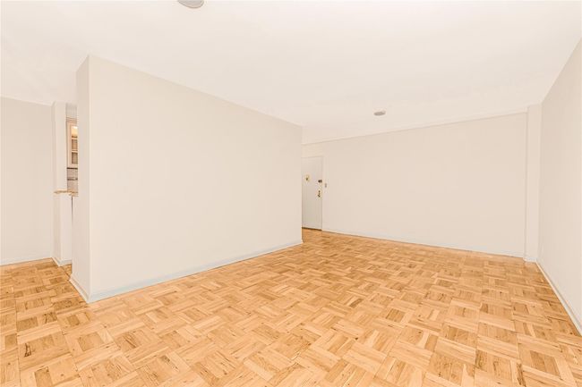 Spare room featuring baseboards | Image 14