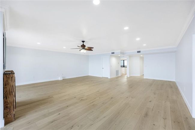 Looking toward dining, kitchen and foyer | Image 19