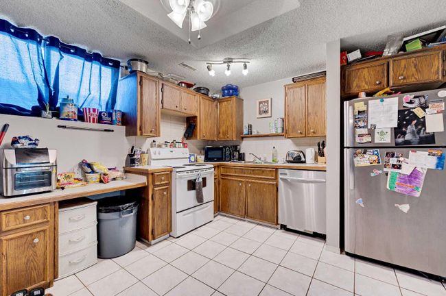5220 19 Avenue Nw, Home with 4 bedrooms, 2 bathrooms and 5 parking in Calgary AB | Image 20