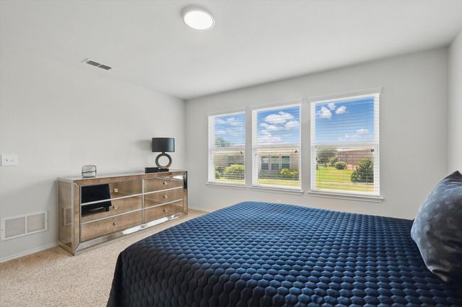 Primary Bedroom with abundance of outdoor light | Image 16