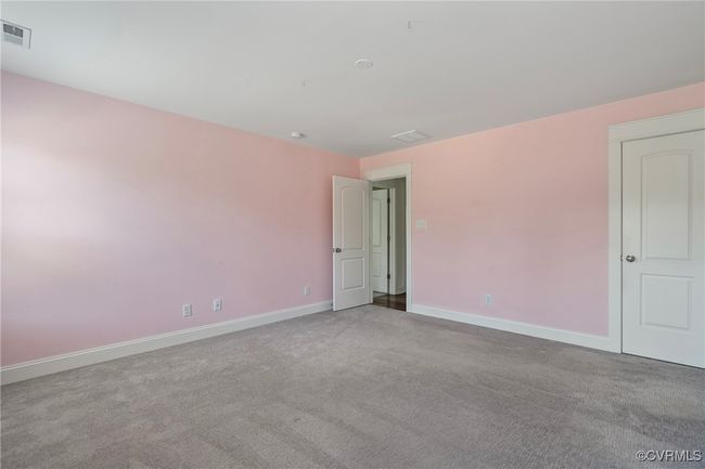 Empty room featuring carpet flooring and baseboards | Image 32