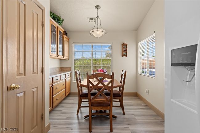Dining room featuring light wood-style floors | Image 17
