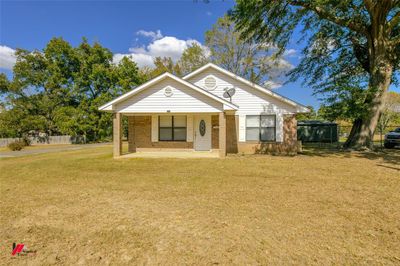 View of front of property with covered porch and a front lawn | Image 2