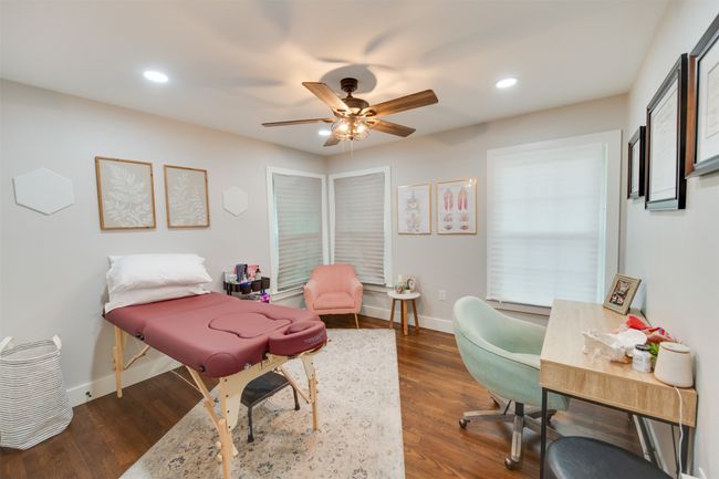 Office area featuring a ceiling fan, baseboards, dark wood-style flooring, and recessed lighting | Image 18