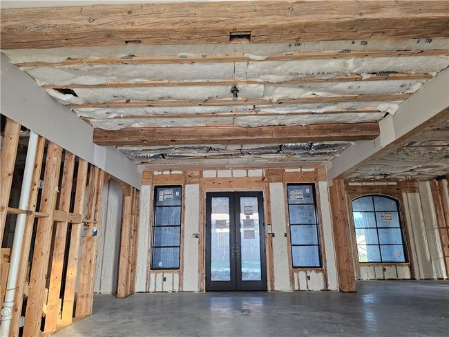 Miscellaneous room with french doors and finished concrete flooring | Image 17