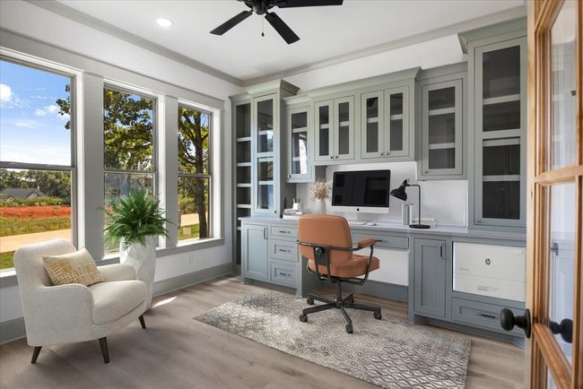 Office with built in desk, light wood-type flooring, ceiling fan, and recessed lighting | Image 31