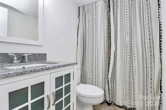 Full bathroom in lower level situated perfectly between 2 bedrooms. | Image 17