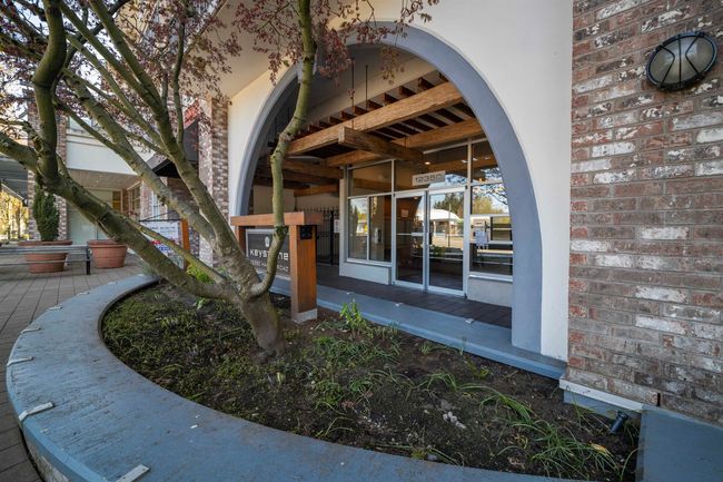 View of exterior entry featuring brick siding and stucco siding | Image 27