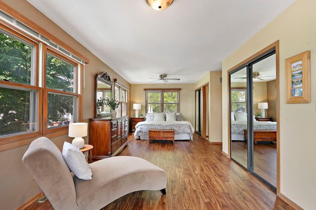 The oversized primary suite has double closets, a | Image 17
