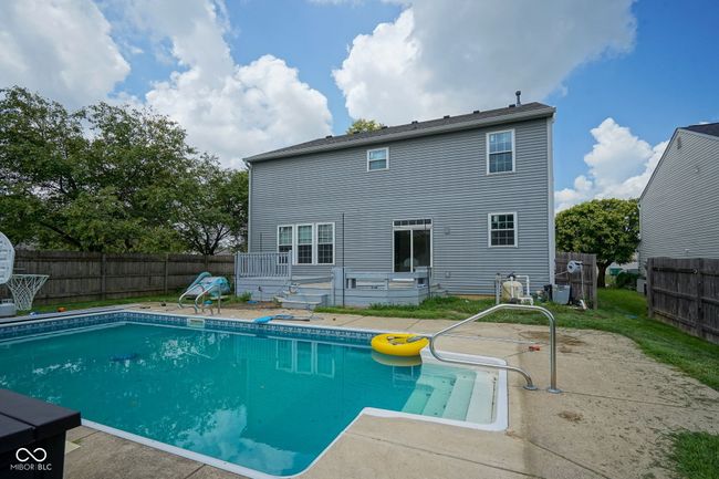 view of pool featuring a fenced backyard and a patio | Image 42
