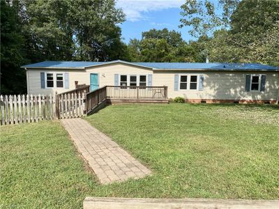 Newer Metal Roof & Replacement Windows | Image 1