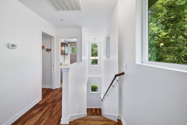 Stairway with wood-style finished floors and​​‌​​​​‌​​‌‌​‌‌​​​‌‌​​‌‌​‌​​​​​‌ baseboards | Image 18