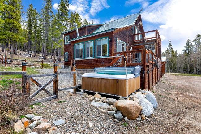 Fenced yard and hot tub | Image 5