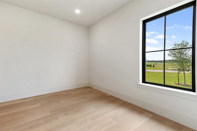 The Primary Closet is massive and awaits a customized design that will suit the buyers needs. With an acceptable offer, an allowance will be provided at closing for the completion and installation of the closet cabinetry and hardware. | Image 22