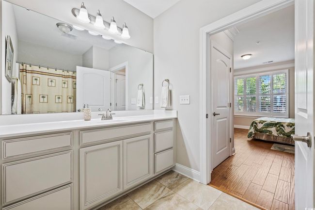 Full bath with vanity and baseboards | Image 18