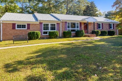 Ranch-style home featuring a front yard | Image 1