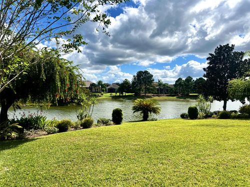 8860 Bridgeport Bay Cir, MOUNT DORA, FL, 32757-8856 | Card Image
