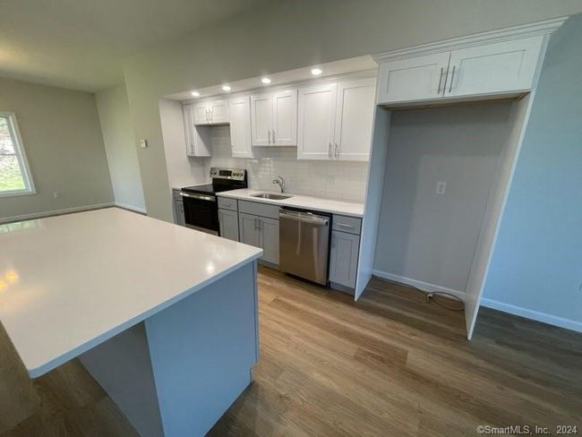 65 Belvedere Dr, Condo with 2 bedrooms, 3 bathrooms and null parking in Tolland CT | Image 7