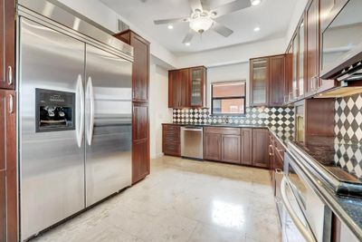 501 - 1640 Presidential Way, Condo with 4 bedrooms, 3 bathrooms and null parking in West Palm Beach FL | Image 2