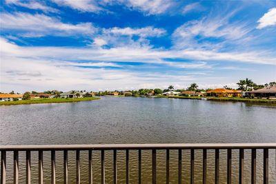 12908 Sw Doug Drive, Townhouse with 3 bedrooms, 2 bathrooms and null parking in Lake Suzy FL | Image 1