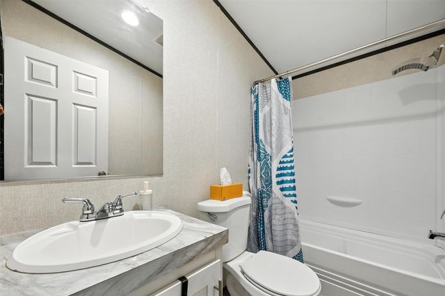 Full bathroom with shower / bath combo and vanity | Image 8