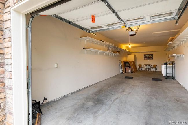 Large tandem garage with included gun safe | Image 36