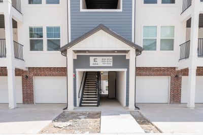 View of front facade with a garage | Image 2