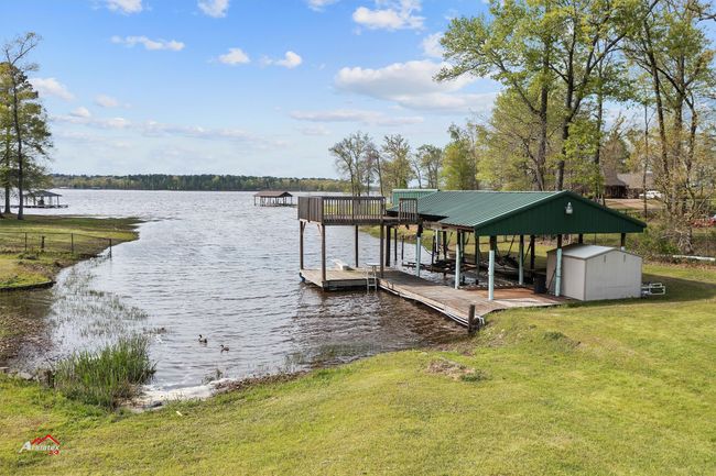 Quiet inlet with private boat house with several boat slips. | Image 6