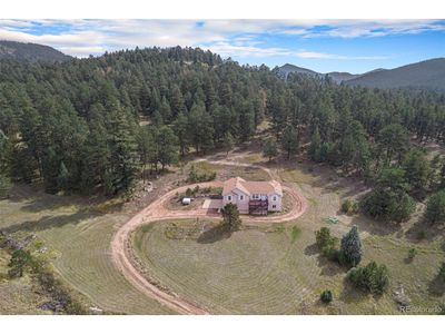 4930 Parmalee Gulch Rd, House other with 3 bedrooms, 3 bathrooms and null parking in Indian Hills CO | Image 1