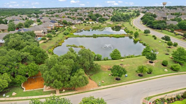 Aerial view of residential area Park and a body of water | Image 37