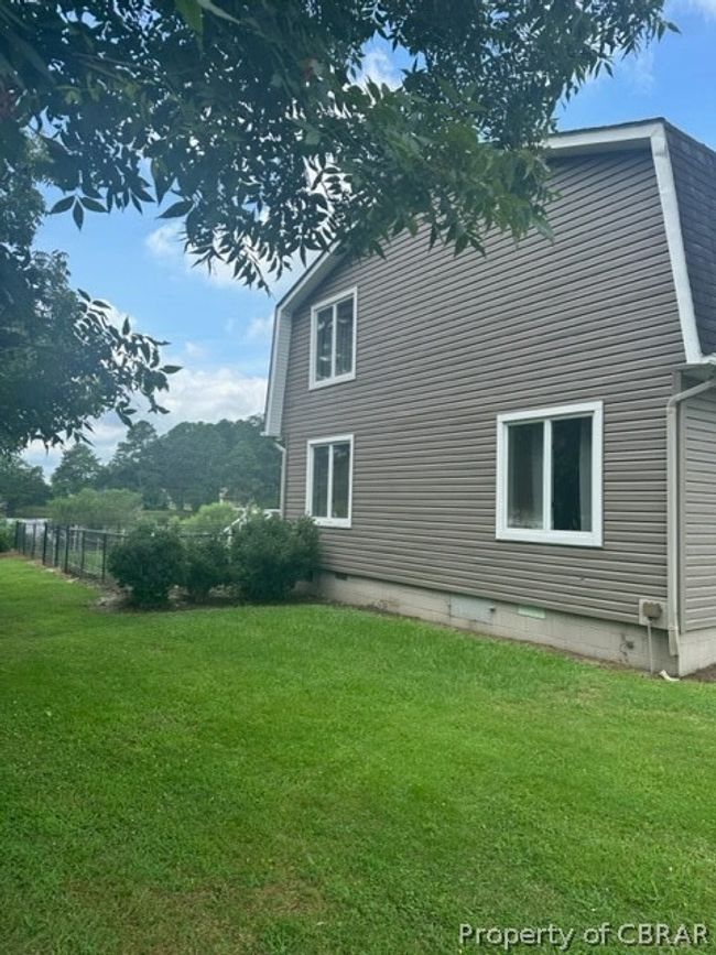 View of side of property featuring a lawn | Image 23