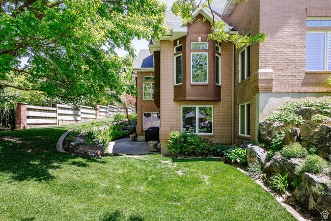 Rear view of house featuring brick siding | Image 80