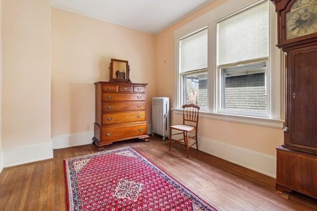 dressing room to primary bedroom with 2 walk-in closets | Image 24