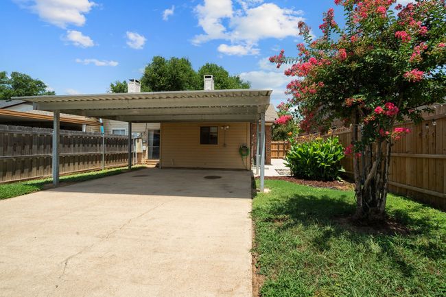 View of vehicle parking with driveway | Image 29
