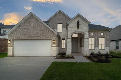 Welcome home to 3028 Mesquite Pod Trail located in Barton Creek Ranch and zoned to Conroe ISD. | Image 1