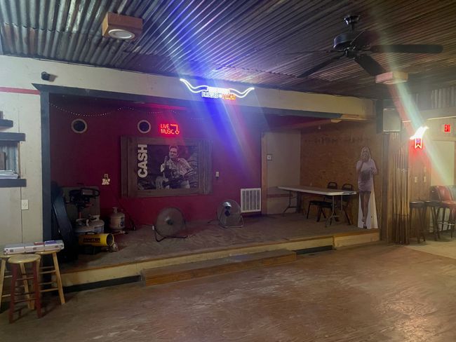 Miscellaneous room featuring concrete flooring and a ceiling fan | Image 8