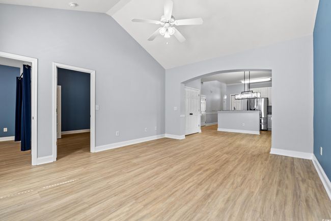 high vaulted ceiling, and arched walkways | Image 10