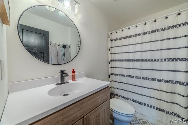 Full bath featuring vanity and curtained shower | Image 43