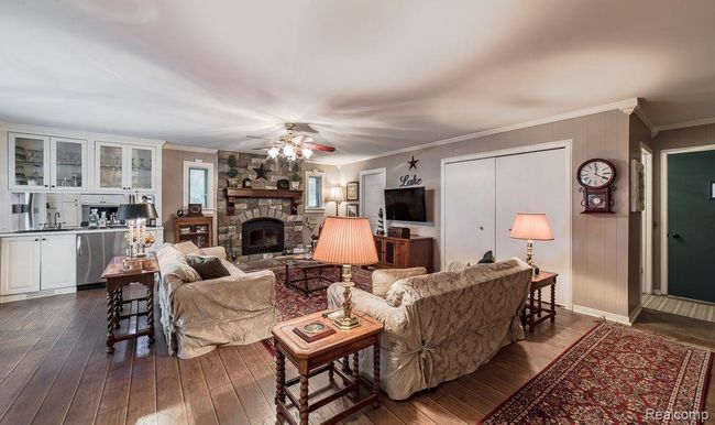 Beautiful family room with laminate wood flooring | Image 20