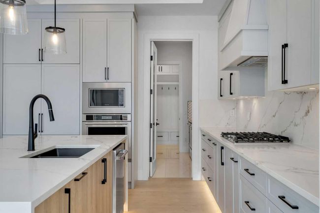 223 Kinniburgh Loop, House other with 4 bedrooms, 4 bathrooms and 5 parking in Chestermere AB | Image 23