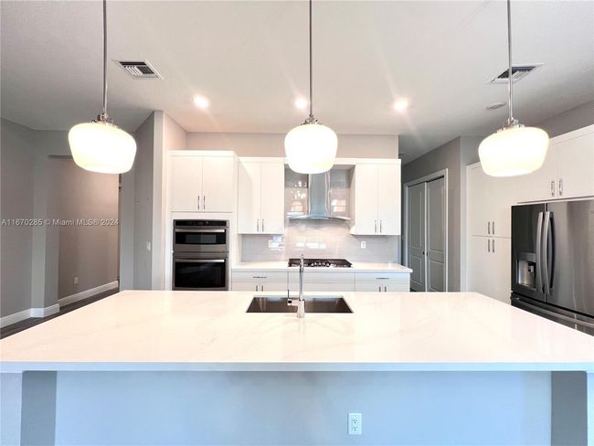 12070 - 12070 N Baypoint Cir, House other with 3 bedrooms, 2 bathrooms and null parking in Parkland FL | Image 9
