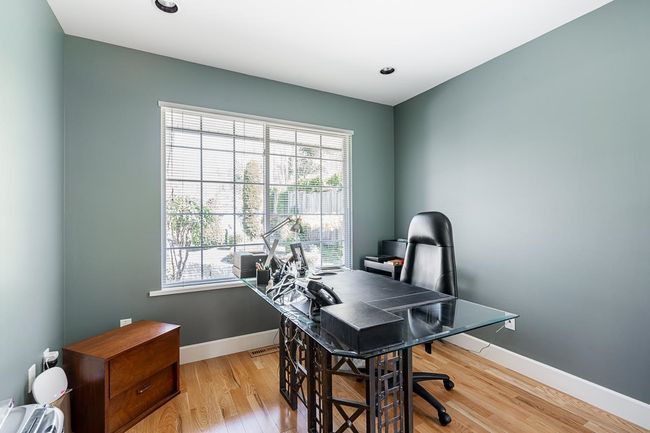 Office area featuring baseboards and light wood-style floors | Image 7
