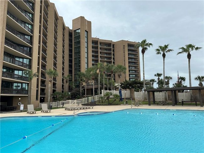 401 is on the end by the pool, and has great pool and bay views from the guest balcony. | Image 30