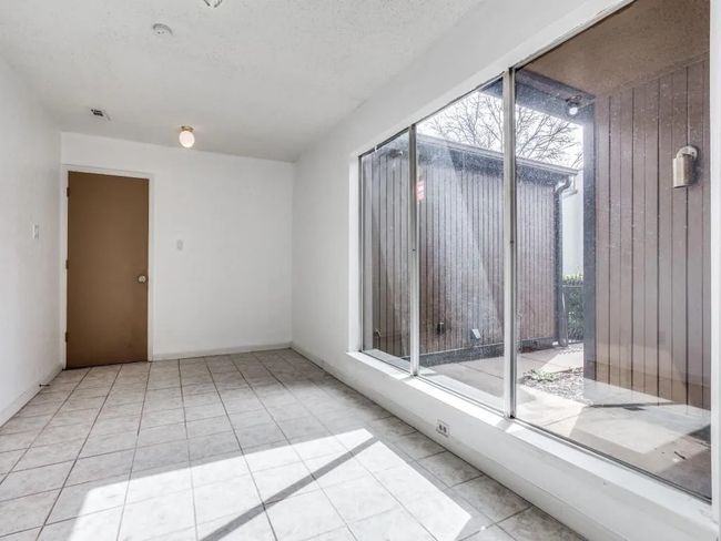 Unfurnished room with tile patterned flooring | Image 7